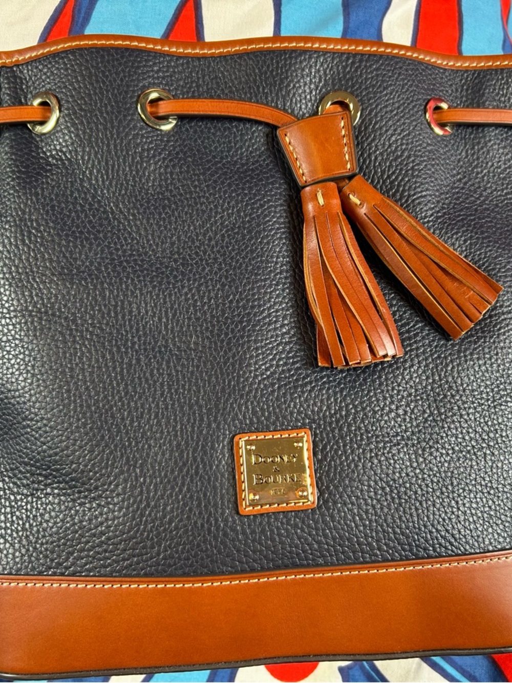 Dooney & Bourke Navy Pebbled Leather Shoulder Bag with Brown Trim and Tassels